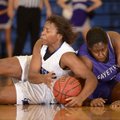 Taylor Strickland, left, Rogers High, battles for a loose ball Friday with Fayetteville’s Brittany A...