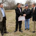 Mike Norton, from left, executive director of the Northwest Arkansas Economic Development District, ...