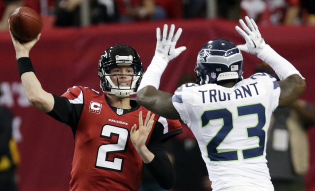 atlanta-falcons-quarterback-matt-ryan-2-throws-against-seattle-seahawks-cornerback-marcus-trufant-23-during-the-second-half-of-an-nfc-divisional-playoff-nfl-football-game-sunday-jan-13-2013-in-atlanta