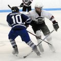 Weston Easley, right, with the Northwest Arkansas Ice Hogs checks Connor Prochonow of Rockhurst High...