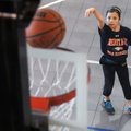 Lily Stitt, 9, practices her free throws Sunday before the start of the 41st annual Elks National Ho...