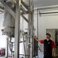 Jesse Core talks about the still Friday at his microbrewery, Core Brewing Company, in Springdale. Th...
