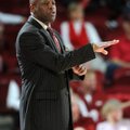 Arkansas coach Mike Anderson directs players Saturday during the second half against Vanderbilt at B...