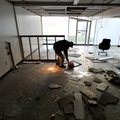Fayetteville Mayor Lioneld Jordan takes a look around one of the many abandoned rooms at the former ...