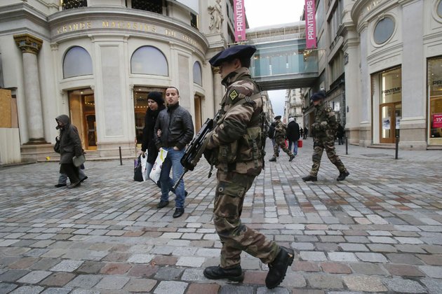 french-army-soldiers-patrol-along-a-main-department-store-in-paris-tuesday-jan-15-2013-armed-soldiers-are-on-patrol-in-paris-subways-train-stations-and-some-of-the-worlds-most-recognizable-monuments-to-head-off-terror-attacks-after-frances-military-launched-an-operation-to-push-back-al-qaida-linked-insurgents-in-mali