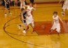 MARK HUMPHREY STAFF PHOTO

Farmington point guard, Jeremy Mueller reacts to a pass going to the wing. Mueller scored Farmington's final 8 points all on free throws to lead the Cardinals past Pea Ridge, 45-39, on Tuesday.