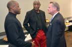 Mike Anderson (left), Nolan Richardson (center) and University of Arkansas chancellor David Gearhart speak during a 2011 event in Fayetteville. 