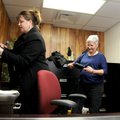 Joanna Maddox, professional development assistant for the Springdale School District, left, and Uni ...