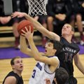 Dylan Gray of Siloam Springs tries to block the shot of Fayetteville’s Caleb Waitsman during the fir...