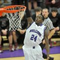Jawan Smith of Fayetteville goes up for a dunk on a fast break against Siloam Springs on Tuesday at ...