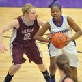 Denesha White of Fayetteville tries to get the ball past Siloam Springs defender Ashlin Stock during...