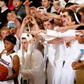 Springdale Har-Ber fans attempt to distract Springdale sophomore Javonda Daniels as she inbounds the...