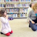 Megan James, from right, Dramatic Book Club director, Mary Alice Larson, Amy Acosta, 5, and Ian Song...