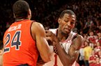 NWA Media/ANTHONY REYES -- Arkansas junior Mardracus Wade (1) gets tied up with Auburn Brian Greene Jr. (24) in the first half Wednesday, Jan. 16, 2013 in Bud Walton Arena in Fayetteville.