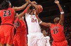 NWA Media/ANDY SHUPE -- Arkansas' Quistelle Williams (24) has the ball knocked away by Georgia's Tamika Willis (24), Shacobla Barbee (20) and Krista Donald (15) Thursday, Jan. 17, 2013, during the first half of play in Bud Walton Arena on the UA campus in Fayetteville.