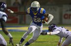 Arkansas Democrat-Gazette/STEPHEN B. THORNTON -- North Little Rock's Altee Tenpenny runs through Fayetteville defenders during their Class 7A playoff football game Nov. 23, 2012 in North Little Rock. 