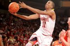 NWA Media/ANTHONY REYES -- Arkansas sophomore BJ Young (11) shoots against Auburn in the second half Wednesday, Jan. 16, 2013 in Bud Walton Arena in Fayetteville. The Razorbacks won 88-80 in double overtime.