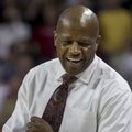 Arkansas head coach Mike Anderson celebrates at the end of the second overtime an NCAA college baske...