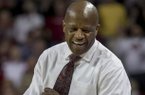 Arkansas head coach Mike Anderson celebrates at the end of the second overtime an NCAA college basketball game against Auburn in Fayetteville, Ark., Wednesday, Jan. 16, 2013. Arkansas defeated Auburn 88-80. (AP Photo/Gareth Patterson)
