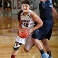 Karen Perez, a Springdale junior, drives to the basket against Springdale Har-Ber during Tuesday’s g...