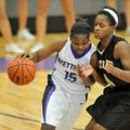 Denesha White of Fayetteville tries get past Little Rock Central defender Jamie Ruffin during the La...