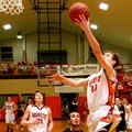 Photo by Randy Moll -- Gravette junior forward Terence Pierce makes a break for a layup in Friday's ...