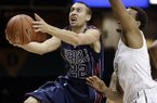 Mississippi guard Marshall Henderson (22) drives past Vanderbilt guard Kevin Bright, right, in the first half of an NCAA college basketball game on Tuesday, Jan. 15, 2013, in Nashville, Tenn. (AP Photo/Mark Humphrey)