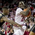 Arkansas' Fred Gully III (12) drives to the basket against Vanderbilt's Dai-Jon Parker (24) during t...