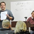 Keith Hoggard, left, director of middle school ministries at Central United Methodist Church in Faye...