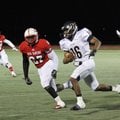 Martrell Spaight (27) tracks down an opposing player in a junior college game. The linebacker signed...