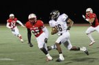 Martrell Spaight (27) tracks down an opposing player in a junior college game. The linebacker signed his letter of intent to play for the Razorbacks and visited Arkansas for the first time this weekend.