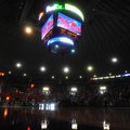 The overhead scoreboard and emergency lights illuminate the court after the main lights went out at ...