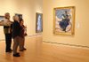 STAFF PHOTO SAMANTHA BAKER
Sara Bainbridge, volunteer gallery guide, center, talks to Myrtis Wyly, left, and Phoebe Goodwin about "Rosie the Riveter" by Norman Rockwell Thursday, Jan. 10, 2013, during a tour of Crystal Bridges Museum of American Art in Bentonville. A temporary exhibit featuring 50 paintings, 323 Saturday Evening Post covers, and other works by Norman Rockwell will open March 9 at Crystal Bridges. Tickets for the exhibit will be $12 for non museum members and free for members. The exhibit will last through May 27.