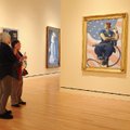 STAFF PHOTO SAMANTHA BAKER
Sara Bainbridge, volunteer gallery guide, center, talks to Myrtis Wyly, ...