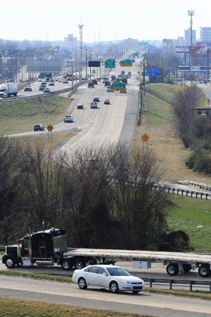 The Interstate 30 and Interstate 40 interchange is seen Wednesday looking south from North Little Rock toward Little Rock. One of the plans in the works at the Arkansas Highway and Transportation Department is to widen I-30 from the I-40 interchange to the I-30 and I-530 interchange. 