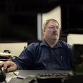 Sgt. Dennis Schumacher works at his desk Friday in the Benton County Sheriff’s Office’s new cybercri...