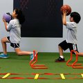 Mandy Parker, left, 10, and her brother, Manuel Parker, 6, both of Wesley, do lunges while working o...
