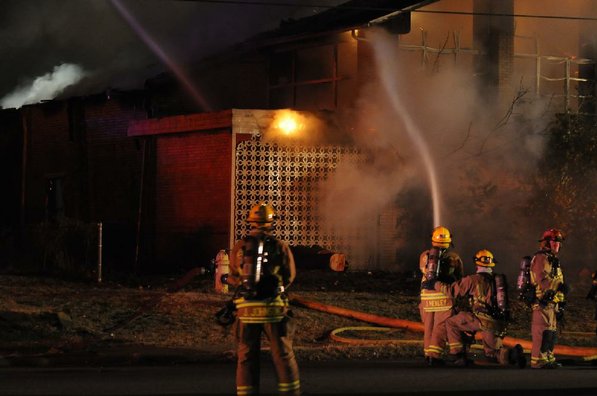 
                               
                                  Photo by Anthony Reyes&mdash;
                               
                           
                           Springdale firefighters respond to a fire at an abandoned church Sunday, Jan. 20, 2013 on the north east corner of Grove Avenue and Thompson Street in Springdale.