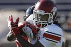 Senior Bowl South Squad wide receiver Cobi Hamilton of Arkansas catches a pass during Senior Bowl football practice at Ladd-Peebles Stadium in Mobile, Ala., Tuesday, Jan. 22, 2013. (AP Photo/Dave Martin)