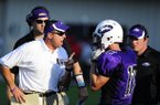 Lonoke head coach Doug Bost gives wide receiver Shane Edwards (17) some words of encouragement during the second quarter of the Hootens.com Kickoff Classic in Pine Bluff.