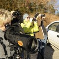 Carole Jones of Fayetteville looks through a spotting scope at waterfowl on Beaver Lake during a Nor...