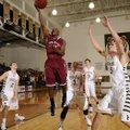 Tereke Eckwood, Springdale High, puts a shot up Tuesday in front of Bentonville’s Austin Haggard, ce...