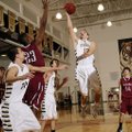 Bentonville’s Austin Heard takes the ball to the basket over Springdale’s Brendan Cook during the Ti...