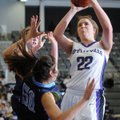 Marleeya Montgomery, left, Springdale Har-Ber, is knocked down after a charge by Sydney Crockett of ...