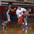 Little Rock Parkview’s Anton Beard (33) tries to dribble around Little Rock Hall defender Javon Perr...
