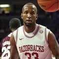 Arkansas' Marshawn Powell (33) watches the ball after a dunk during the first half of an NCAA colleg...