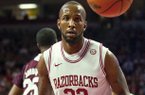 Arkansas' Marshawn Powell (33) watches the ball after a dunk during the first half of an NCAA college basketball game against Mississippi State in Fayetteville, Ark., Wednesday, Jan. 23, 2013. Arkansas won 96-70. (AP Photo/April L. Brown)