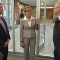 Ric Clifford with NorthWest Arkansas Community College, left, and Ken Ramey, superintendent of Siloa...