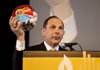 Robert McDonald, chairman, president and chief executive officer of Procter & Gamble Co., shows a package of Tide Pods detergent during a speech in Chicago in September. 