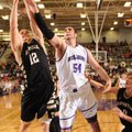 Tyler McCullough, right, a Fayetteville senior and Bentonville senior guard Austin Heard reach for a...
